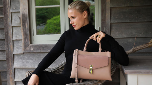 Mocha is the 2025 colour of the Year - Model holding a Cara Mocha Tote