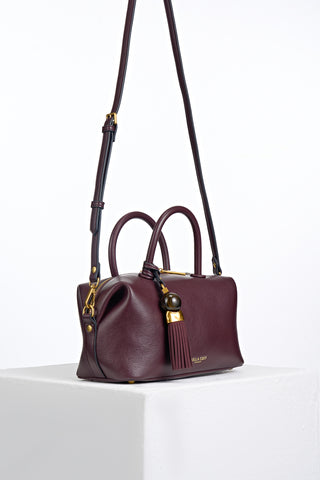 Alessia Black Cherry faux leather Bowler Tote by Luella Grey with detachable crossbody strap attached to gold rings on the side