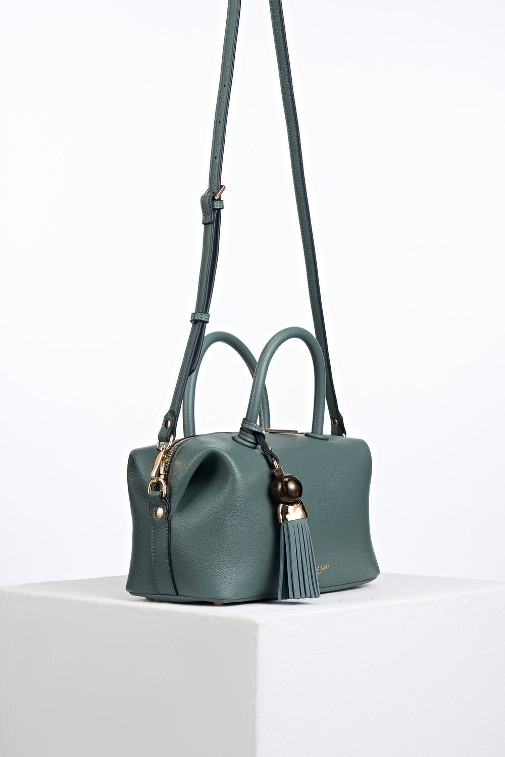 Alessia Steel Green faux leather Bowler Tote by Luella Grey with detachable crossbody strap attached to gold rings on the side