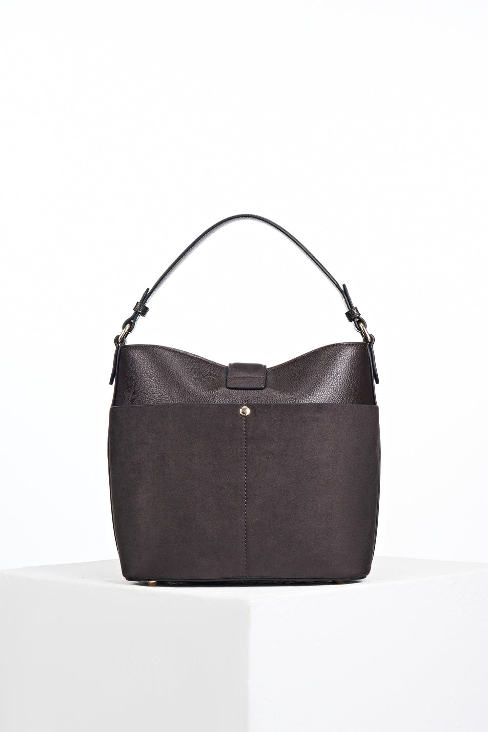 Back view of Indra Chocolate recycled suede and faux leather Bucket Crossbody showing the mag dot closure back slip-in pocket