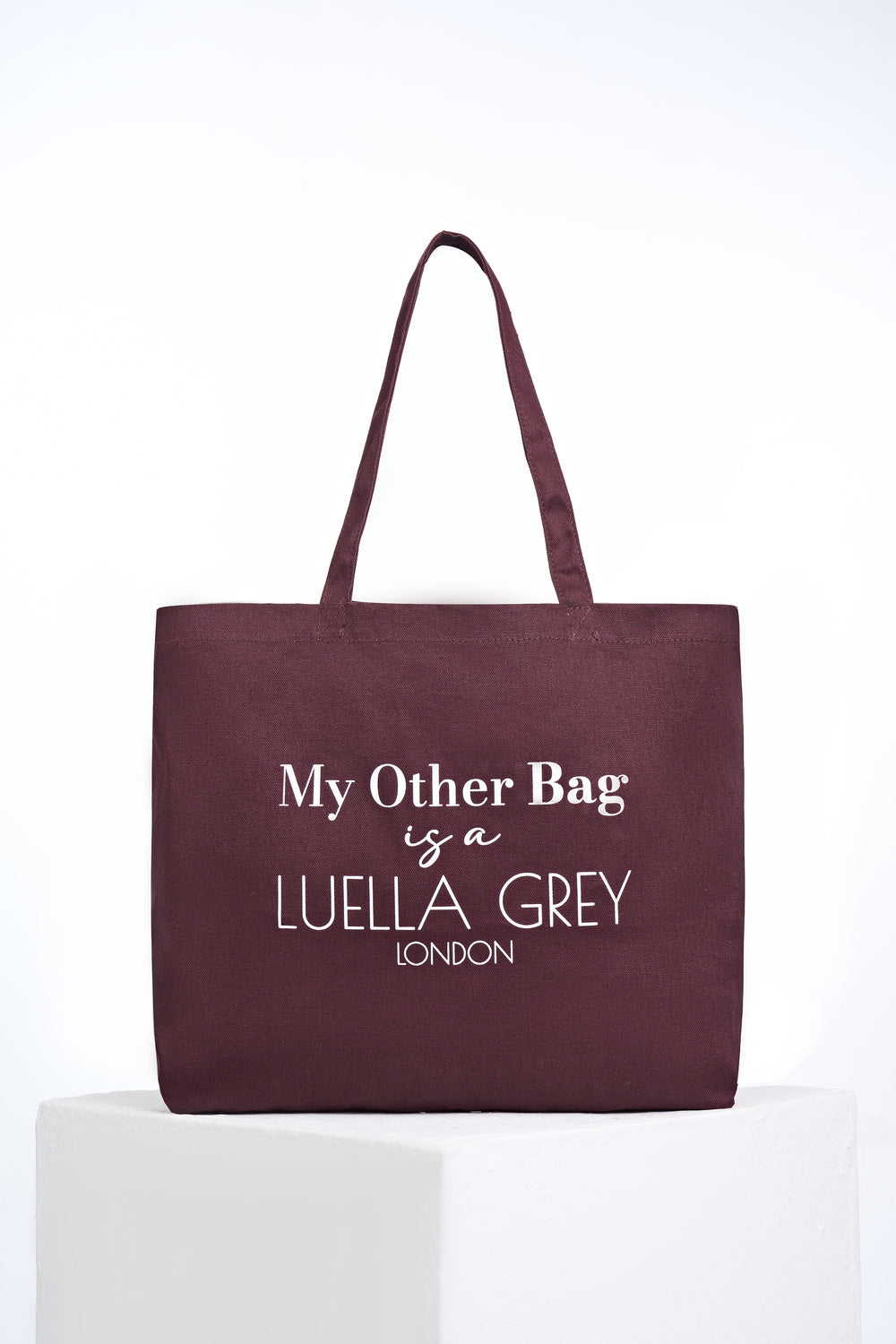 Front of Luella Cherry Canvas Shopper with printed white writing details 