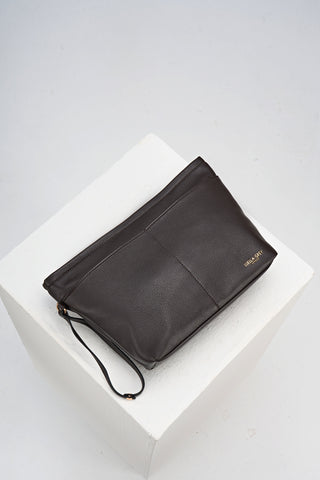 Overhead view of the internal detachable sipper pouch from Saskia Chocolate faux leather Woven Tote