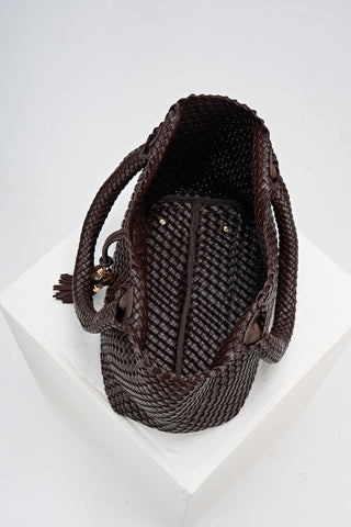 Overhead view of the inside of Saskia Chocolate faux leather Woven Tote 