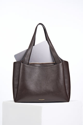 Back of Stella Chocolate faux leather Laptop Tote with laptop in the removable central zipper laptop compartment 