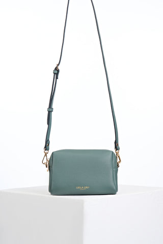 Detachable zipper pouch with detachable crossbody strap attached from Suky Steel Green faux leather Woven Crossbody 