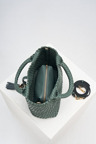 Overhead view of Suky Steel Green faux leather Woven Crossbody showing the detachable zipper pouch and detached crossbody strap